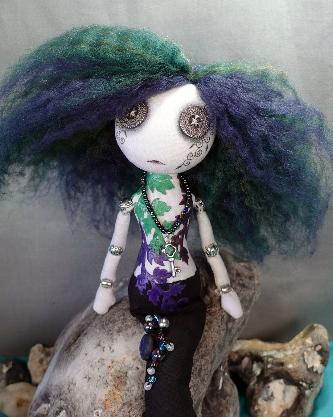 button eyed gothic mermaid doll close up
