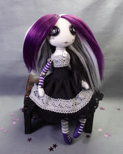 a button eyed, cloth art doll in Ace flag colours, black, grey, white and purple