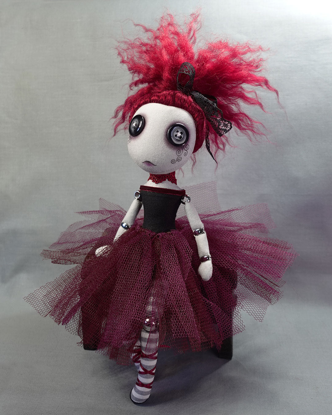 a button eyed Gothic ballerina art doll in burgundy and black