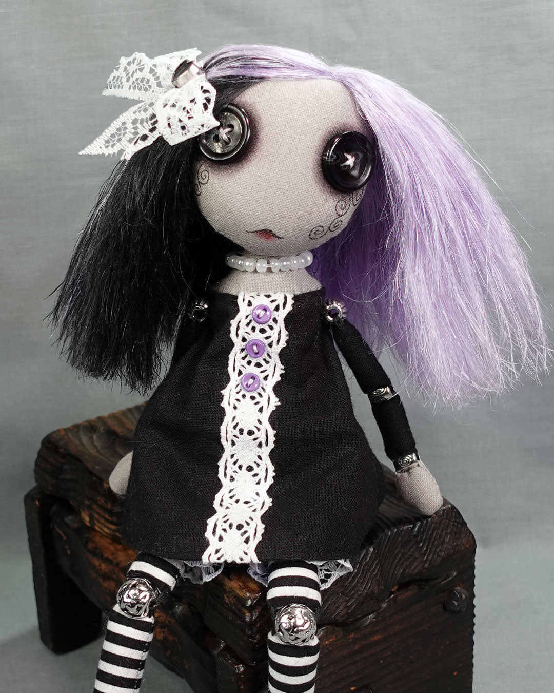 button eyed gothic cloth doll in black and white dress