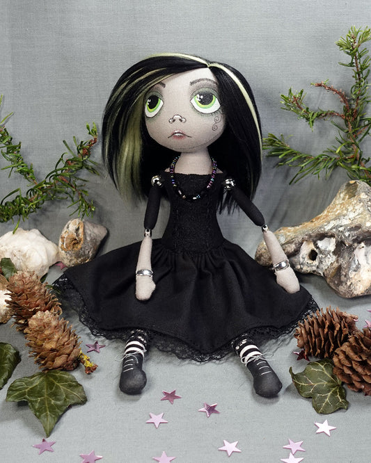 Gothic cloth art doll with green eyes in black dress