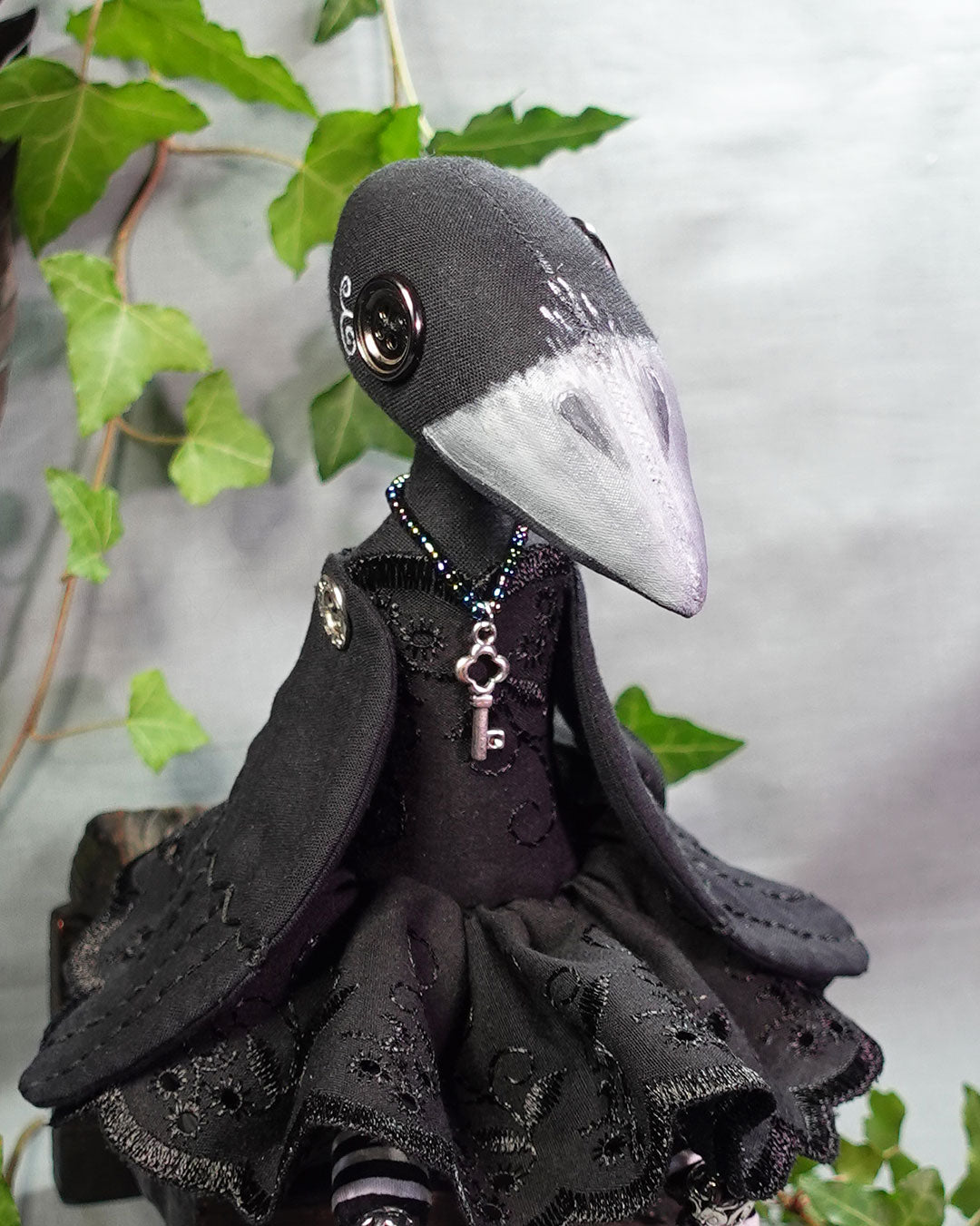 Gothic crow art doll in black dress with key necklace