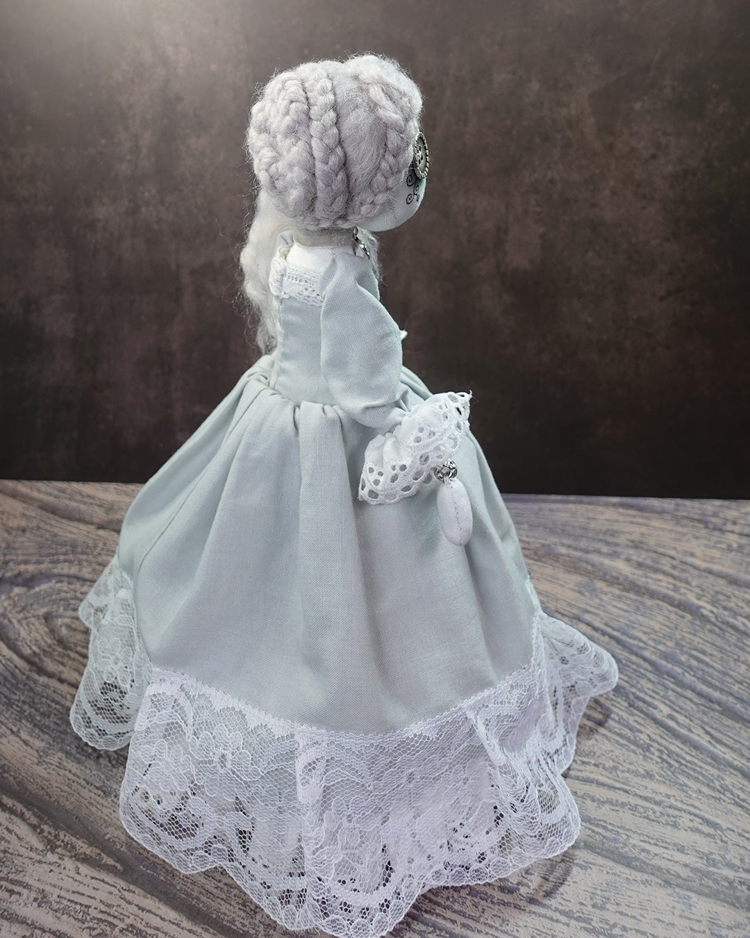 rear view of ghost art doll with braided victorian hairstyle